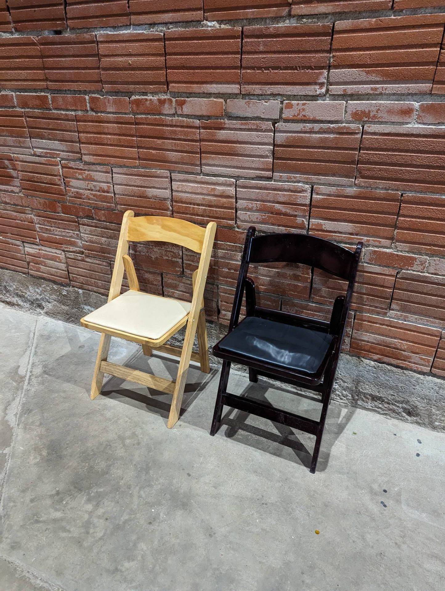 Wooden and dark folding chairs